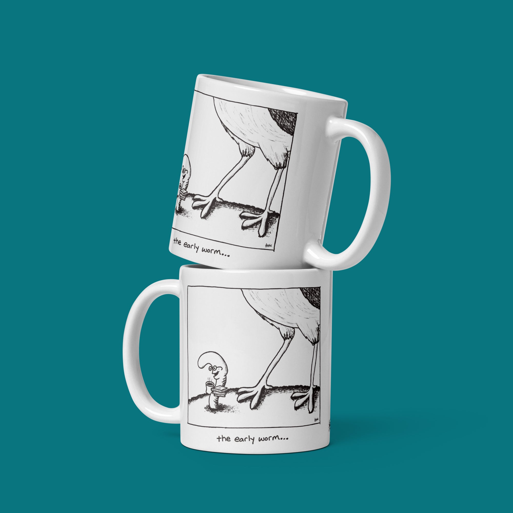 Two white mugs with black illustrations of a bird and a worm on a teal background