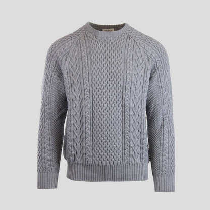 A cable-knit sweater in a heather gray color