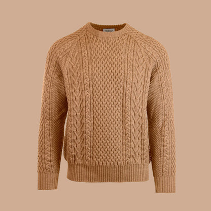 A cable-knit sweater in a khaki color