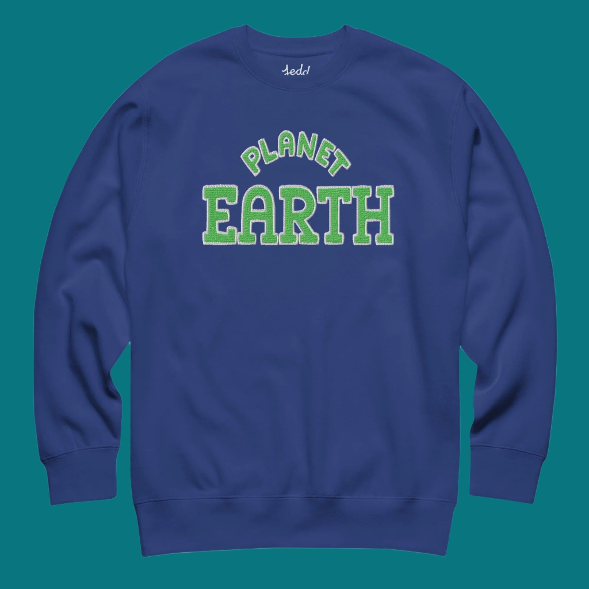 A navy blue sweatshirt that reads Planet Earth