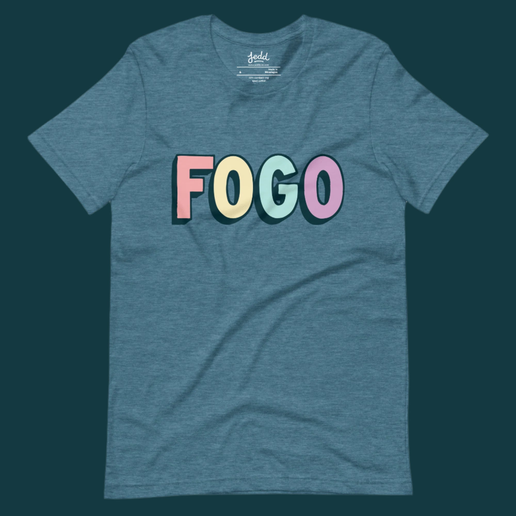 A teal t-shirt that reads FOGO